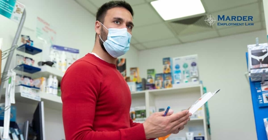 a pharmacist wearing a medical mask