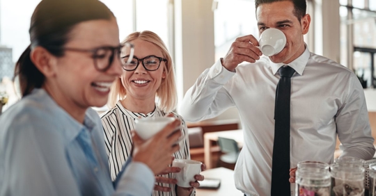 a group of professionals taking a coffee break