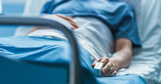 Person in hospital bed