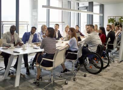 a meeting room filled with people
